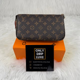 POCHETTE ACCESSOIRES TELA MONOGRAM